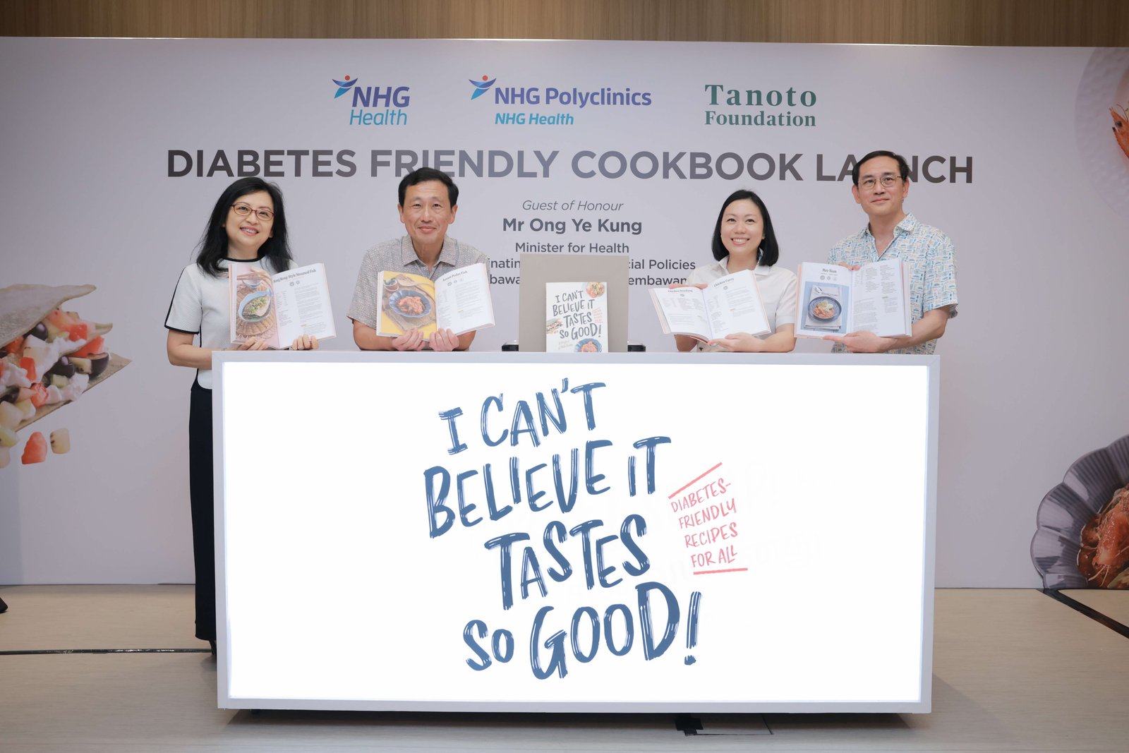 NHG Health And Tanoto Foundation Jointly Launch "I Can’t Believe It Tastes So Good" Healthy Cookbook 1 (Left to right) Associate Professor Karen Ng, Chief, Primary Care, Population Health, NHG Health, Chief Executive Officer, NHG Polyclinics; Mr Ong Ye Kung, Minister for Health and Coordinating Minister for Social Policies, Adviser to Sembawang GRC GROs (Sembawang Central); Ms Belinda Tanoto, Member, Board of Trustees, Tanoto Foundation; and Professor Benjamin Seet, Group Chairman Medical Board (Research) and Co-chair, Academic Partnership Office, NHG Health, launching the healthy cookbook ‘I Can’t Believe It Tastes So Good!” at NHG Sembawang Polyclinic.